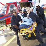 Paramedics unloading patient from Medevac