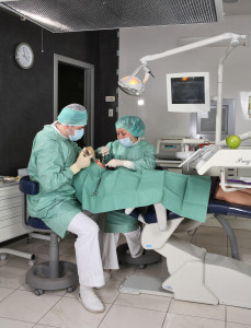 Dentist at work in dental room